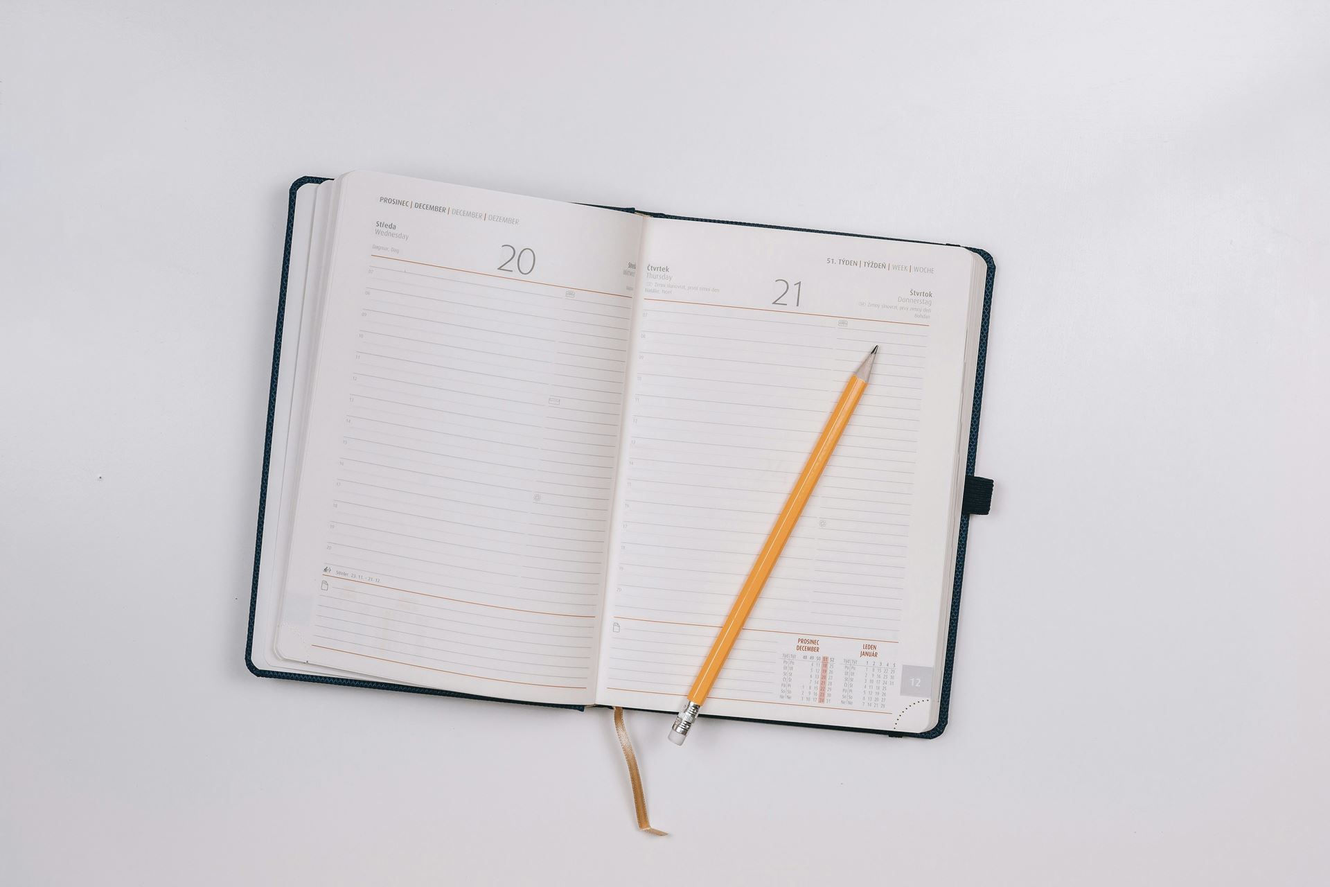 Appointment book with pencil